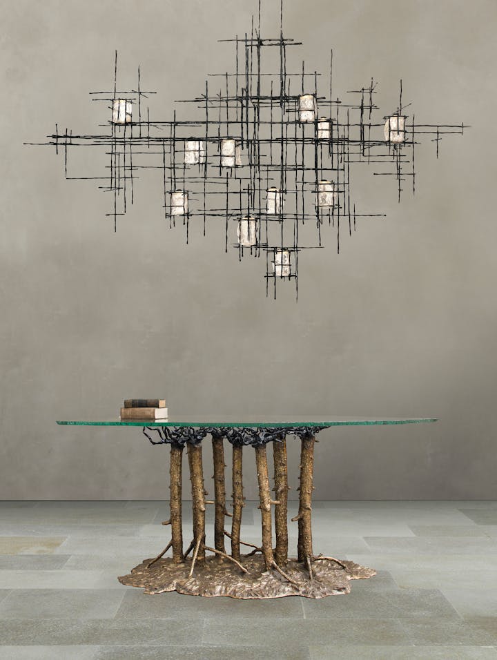 sculptural table and chandelier for contemporary interiors